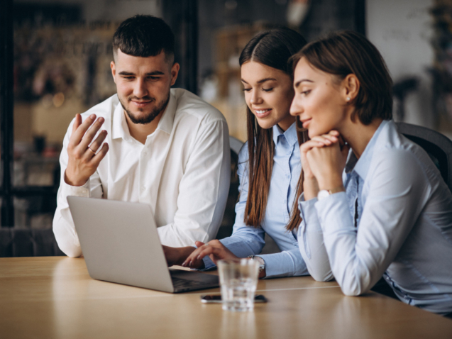 group-people-working-out-business-plan-office